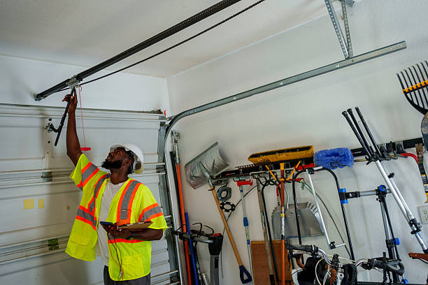 Professional Garage Door Panel Replacement technician working in Caldwell County County, TX